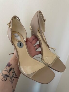 Classic Nude Ankle-Strap Heels with Clear Toe Strap